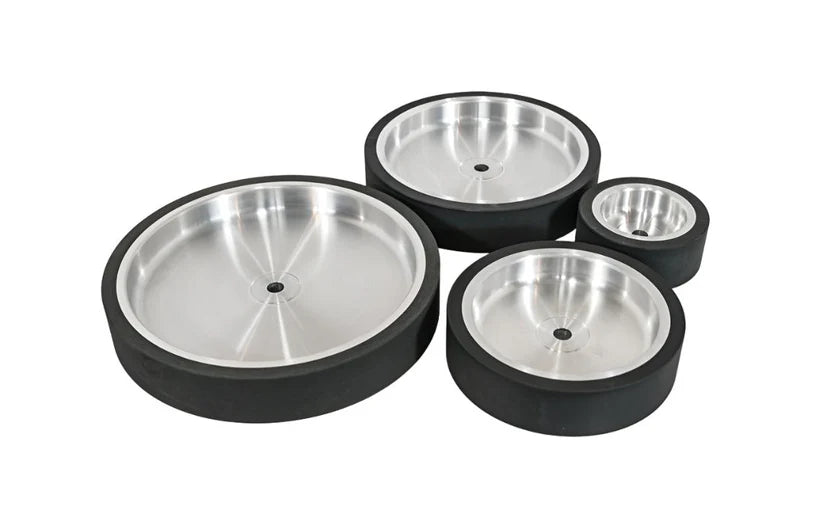 Contact wheels for industrial sanding belts and abrasives